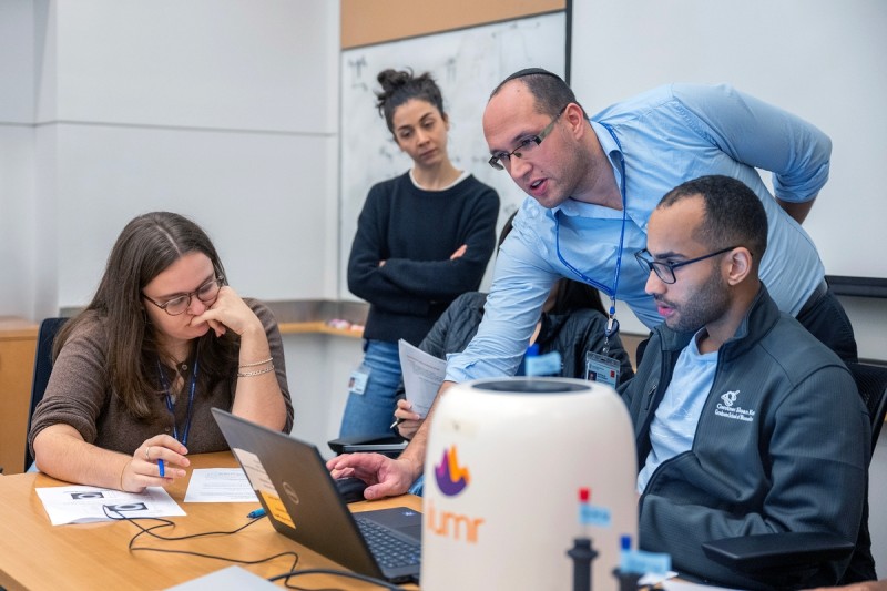 GSK students in the Cancer Engineering Program using a tabletop MRI machine to explore a number of magnetic resonance phenomena, particularly magnetic relaxation properties.